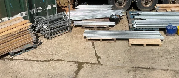 **LIQUIDATION **A Large Assortment of Nearly New Galvanised Steel Scaffolding Including Tubes, Boards, and Fittings…