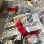 Security-sealed mystery clearance bundle containing branded high-street cosmetics and retail items including The Whit… — image 7