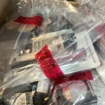 Security-sealed mystery clearance bundle containing branded high-street cosmetics and retail items including The Whit… — image 1