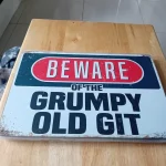 Decorative metal wall signs,hats, water bottles and various branded merchandising items. — image 8